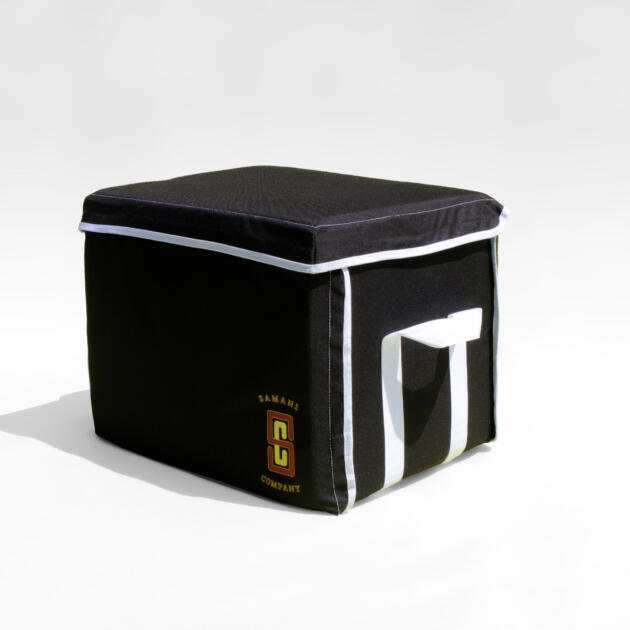 Black Samani Company storage bag with white trim and logo design - cropped white border